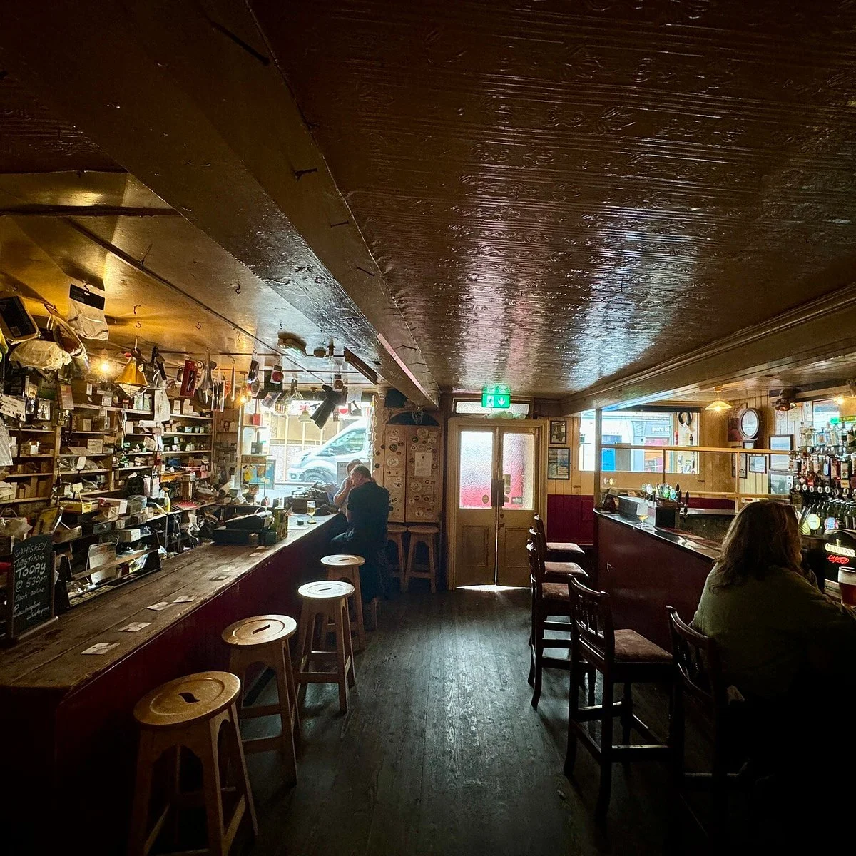 The bar at Foxy John's with warm lighting